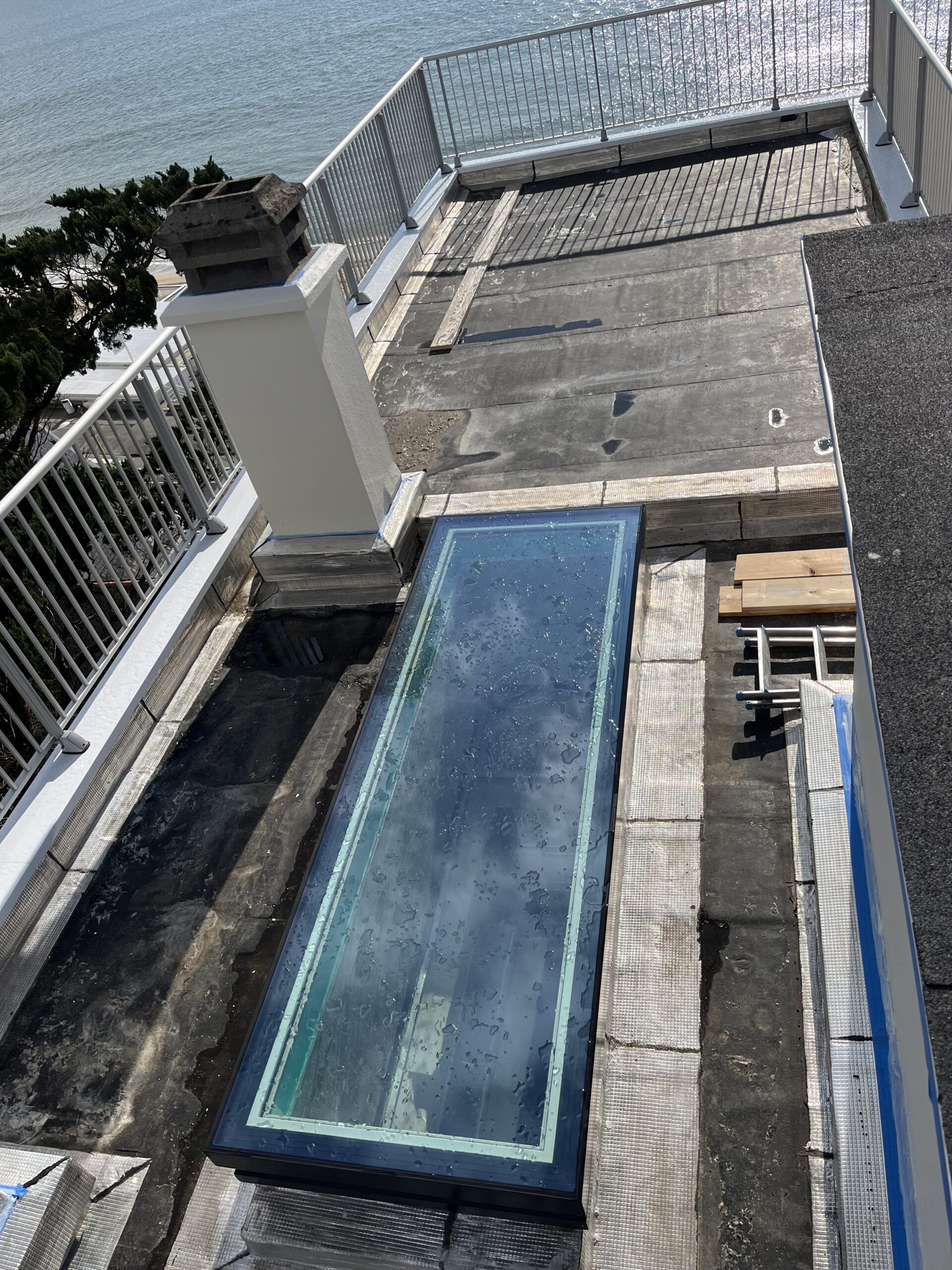 Réfection de l'étanchéité d'une toiture terrasse et création d'un accès privatif depuis l'appartement du dernier étage